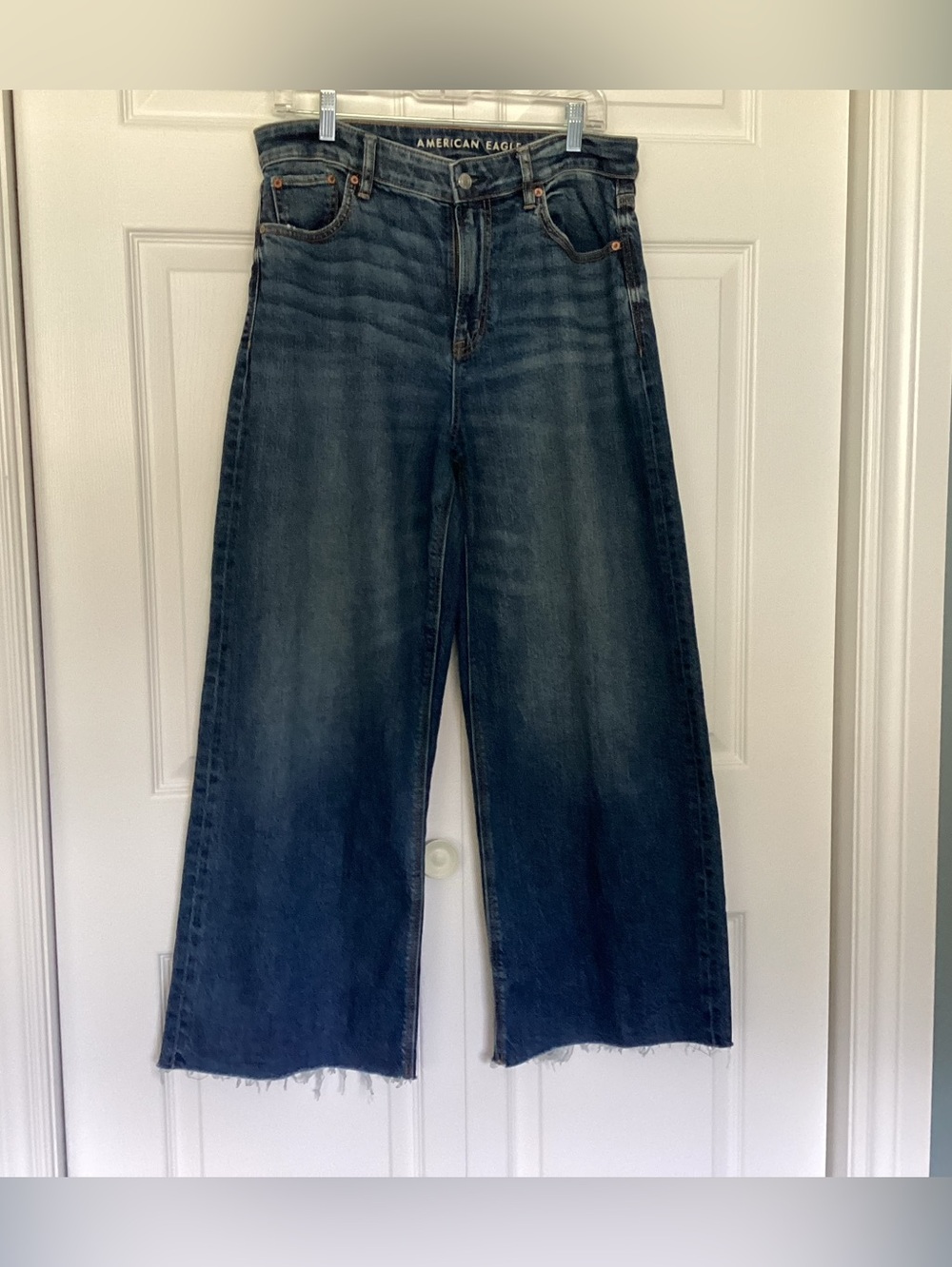 American Eagle Baggy Wide-Leg Raw Hem , Super high rise Jeans in Dark Wash.